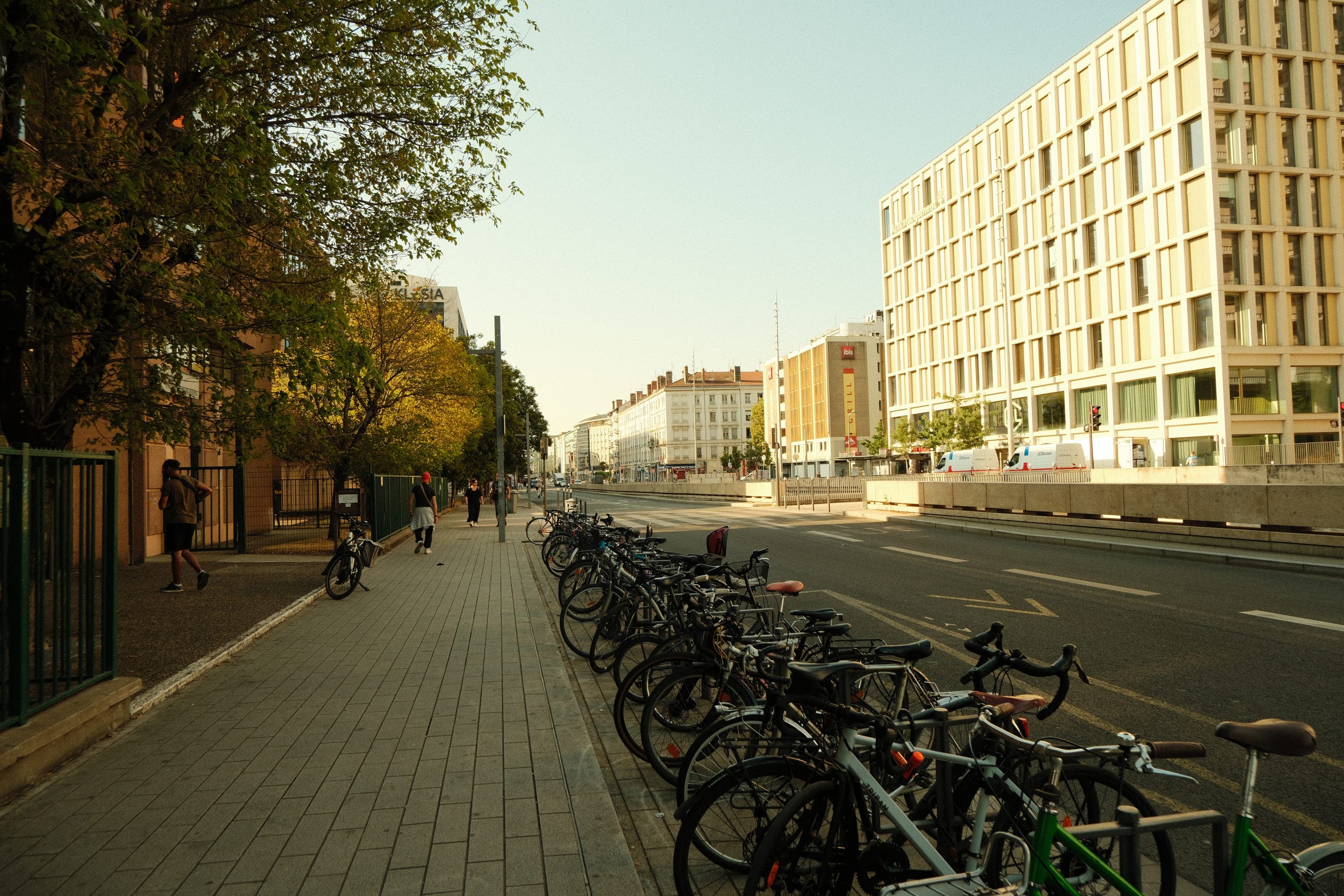 The boulevard, still in shade on one side.